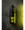 Kuro Tokyo Mule bottle on dark textured surface with neon yellow lighting
