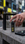 Kuro Tokyo Mule vape bottle with hand reaching toward it